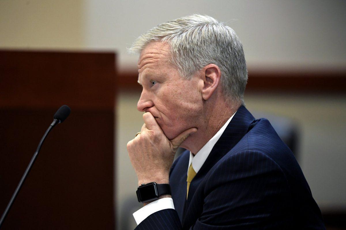 District Attorney George Brauchler listens as Devon Erickson, not pictured, appears at the Douglas County Courthouse in Castle Rock, Colo., on May 15, 2019. (Joe Amon/The Denver Post via AP, Pool)