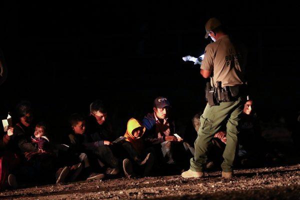 Border Patrol processes 13 Guatemalans who illegally crossed the Colorado River from Mexico into the United States in Yuma, Ariz., on April 14, 2019. (Charlotte Cuthbertson/The Epoch Times)