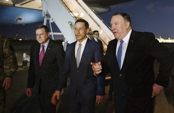Secretary of State Mike Pompeo, right walks with Acting Assistant Secretary for Near Eastern Affairs at the State Department David Satterfield, left, and Charge D'affaires at the U.S. Embassy in Baghdad Joey Hood upon arrival in Baghdad, on May 7, 2019. (Mandel Ngan/Pool Photo via AP)