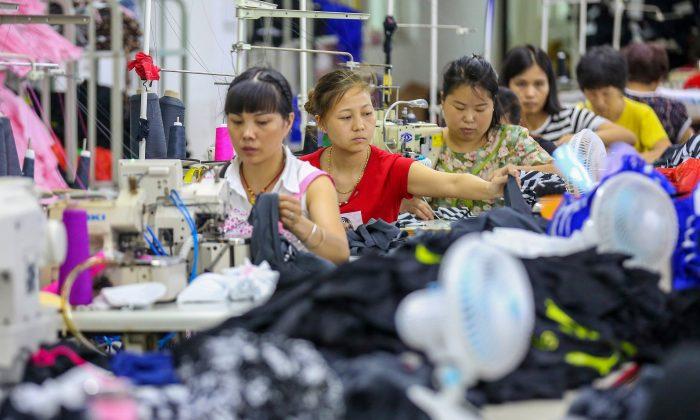 China May Factory Activity Seen Shrinking, Trade Standoff With US Hurts Growth