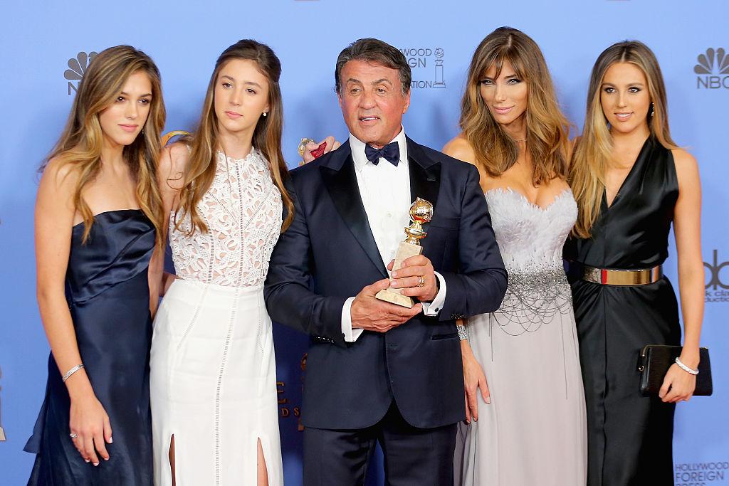 Stallone poses with wife Jennifer Flavin and their daughters Sistine, Scarlet, and Sophia after winning Best Supporting Performance for "Creed" in 2016 (©Getty Images | Mark Davis)