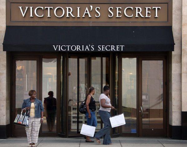 Shoppers walk past Victoria's Secret store in the Lincoln Park neighborhood in Chicago, Ill., on Aug. 4, 2008. (Scott Olson/Getty Images)