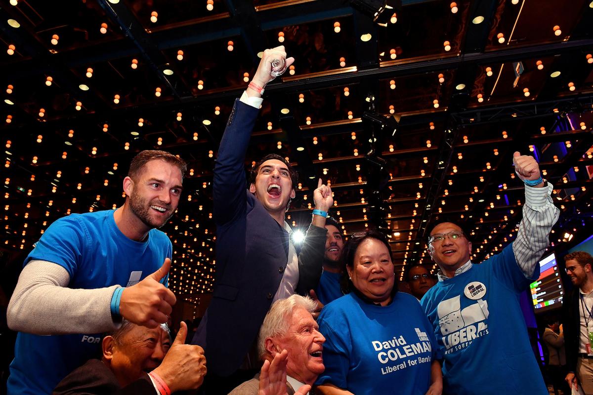 Australia's Liberal Party supporters react during the results count at the Federal Liberal Reception at the Sofitel-Wentworth hotel in Sydney, Australia, May 18, 2019. (AAP Image/Mick Tsikas/via Reuters)
