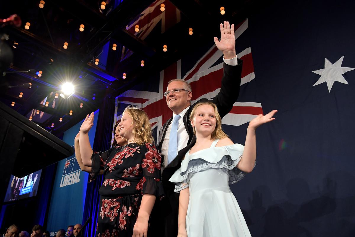 Prime Minister of Australia and leader of the Liberal Party Scott Morrison, flanked by his wife Jenny Morrison and daughters Lily and Abbey, delivers his victory speech at the Sofitel Sydney Wentworth in Sydney, on May 18, 2019. (Tracey Nearmy/Getty Images)