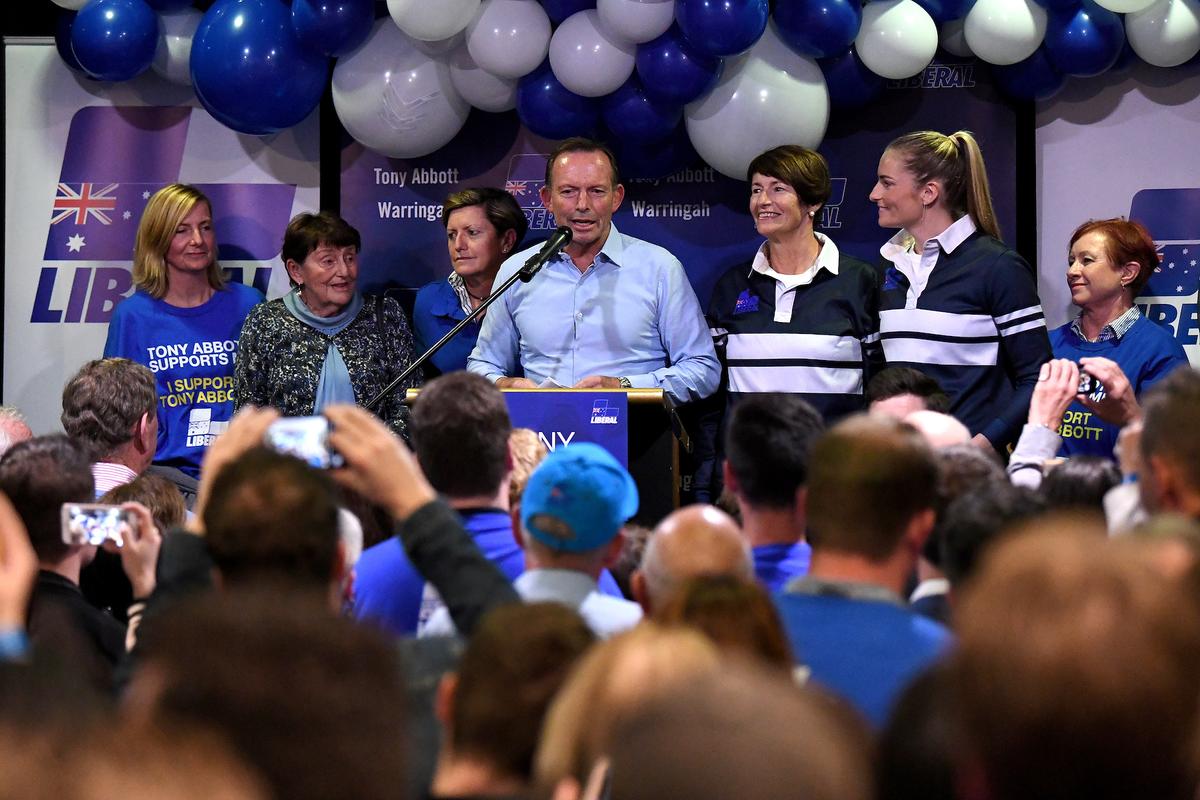 Australia's former Prime Minister and Warringah Liberal candidate Tony Abbott is joined on stage by family members after conceding defeat at Manly Leagues Club in Brookvale, Sydney, Australia, on May 18, 2019. (AAP Image/Bianca De Marchi/via Reuters)