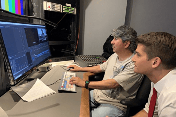 Fox News reporter Bill Melugin (right) and editing engineer Tony Ruiz (left) work on the upcoming film "Sister's Salvation" in Los Angeles on May 17, 2019. (Liu Fei/The Epoch Times)