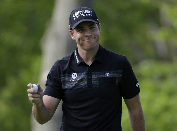 Luke List reacts after sinking a putt on the 14th green during the third round of the PGA Championship golf tournament at Bethpage Black in Farmingdale, N.Y., on May 18, 2019. (Julio Cortez/Photo via AP)