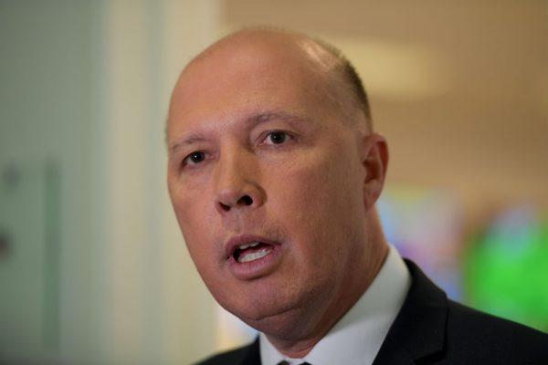 Australian Home Affairs Minister Peter Dutton speaks to media in the Press Gallery at Parliament House on Feb. 13, 2019, in Canberra, Australia. (Tracey Nearmy/Getty Images)