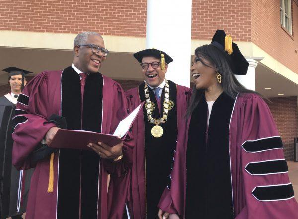 Robert F. Smith (L) laughs with David Thomas (C) and actress Angela Bassett at Morehouse College, in Atlanta, on May 19, 2019. (Bo Emerson/Atlanta Journal-Constitution via AP)