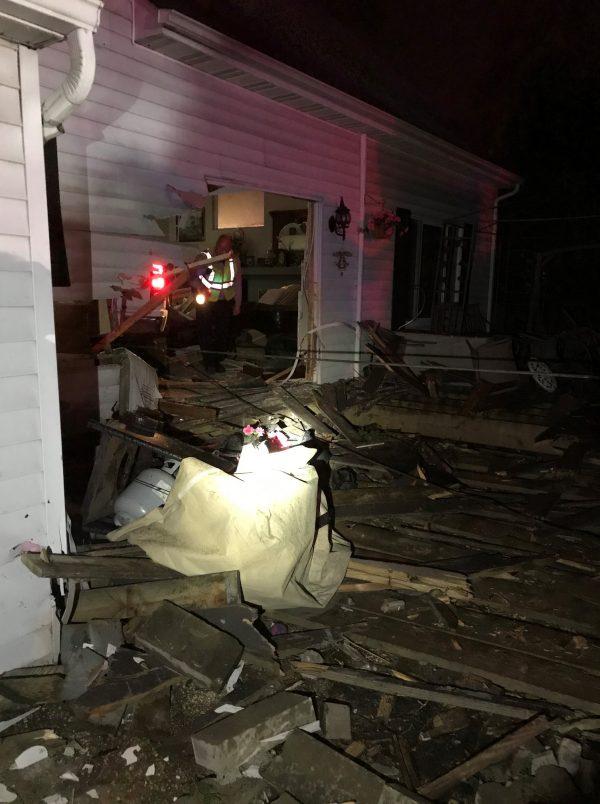 A GMC Pick up truck embedded in a house in Spring Grove, Lake County, Illinois. (Lake County Sheriff's Office)