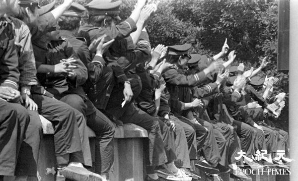 Policemen support the students at Tiananmen Square in Beijing, China in June 1989. (Provided by Liu Jian/The Epoch Times)