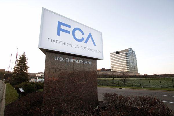 The new Fiat Chrysler Automobiles (FCA) Group sign is shown at the Chrysler Group headquarters in Auburn Hills, Mich., on May 6, 2014. (Bill Pugliano/Getty Images)