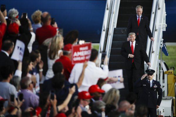 President Donald Trump accompanied by Rep. Fred Keller, R-Snyder, arrive at a campaign rally in Montoursville, Pa., on May 20, 2019. (Matt Rourke/AP Photo)