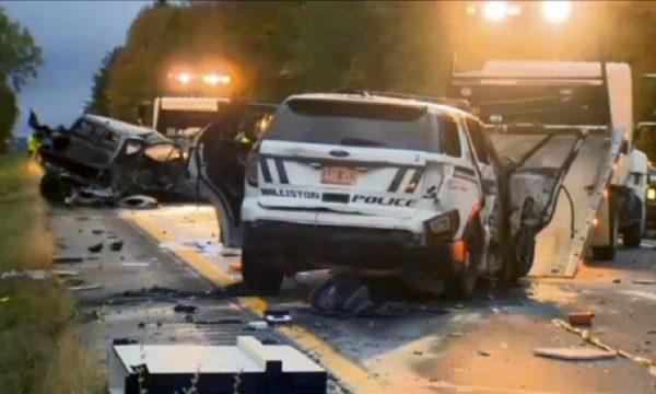 In this still image from video provided by WCAX-TV, workers remove vehicles from Interstate 89 early Sunday, Oct. 9, 2016, in Williston, Vt., after a wrong-way driver caused a crash just before midnight that killed multiple people, before stealing a police cruiser, striking several vehicles and injuring several people. (WCAX-TV via AP)