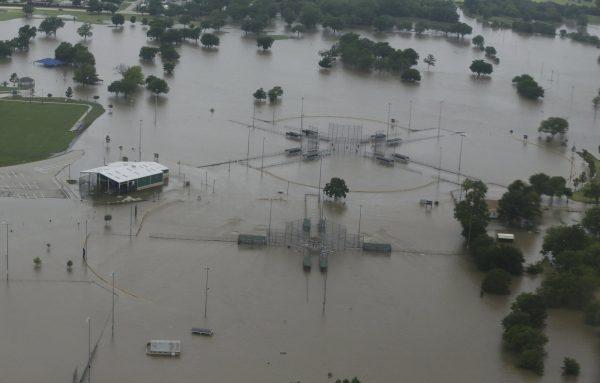 O'Brien Park on North Lewis Ave during flooding on Bird Creek in Tulsa, Okla., on May 22, 2019. (Tom Gilbert/Tulsa World via AP)
