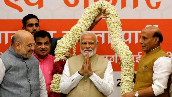 India's Prime Minister Narendra Modi gestures as he is presented with a garland during a thanksgiving ceremony by Bharatiya Janata Party (BJP) leaders to its allies at the party headquarters in New Delhi, India, on May 21, 2019. (Anushree Fadnavis/File Photo/Reuters)