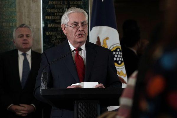 Outgoing Secretary of State Rex Tillerson (R) gives farewell remarks to State Department employees March 22, 2018 at the State Department in Washington. (Alex Wong/Getty Images)