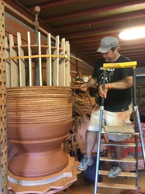 Yannick Fourbet wraps sisal rope around the plywood pot frame. (Courtesy of Yannick Fourbet)