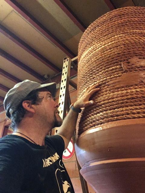 Clay is applied directly to the rope in order to shape the pot. (Courtesy of Yannick Fourbet)