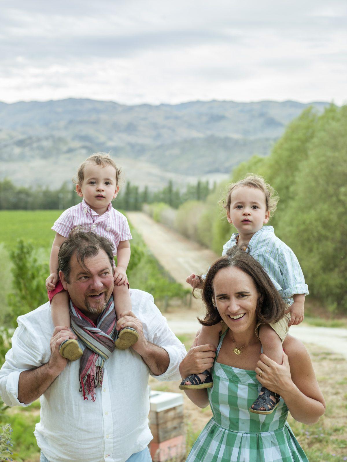 Yannick Fourbet at home with his family—wife Philippa and 3-year-old twins, Mortimer (L) and Augustin—in their Domaine Rewa vineyard on New Zealand's South Island. (Rachael McKenna)