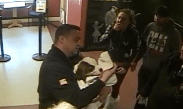 Massachusetts Officers Save Choking Puppy in Police Station