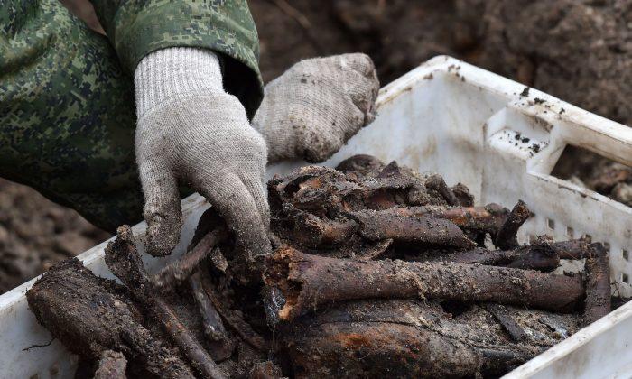 Remains of More Than 1,200 Holocaust Victims Laid to Rest in Belarus After Mass Grave Discovered