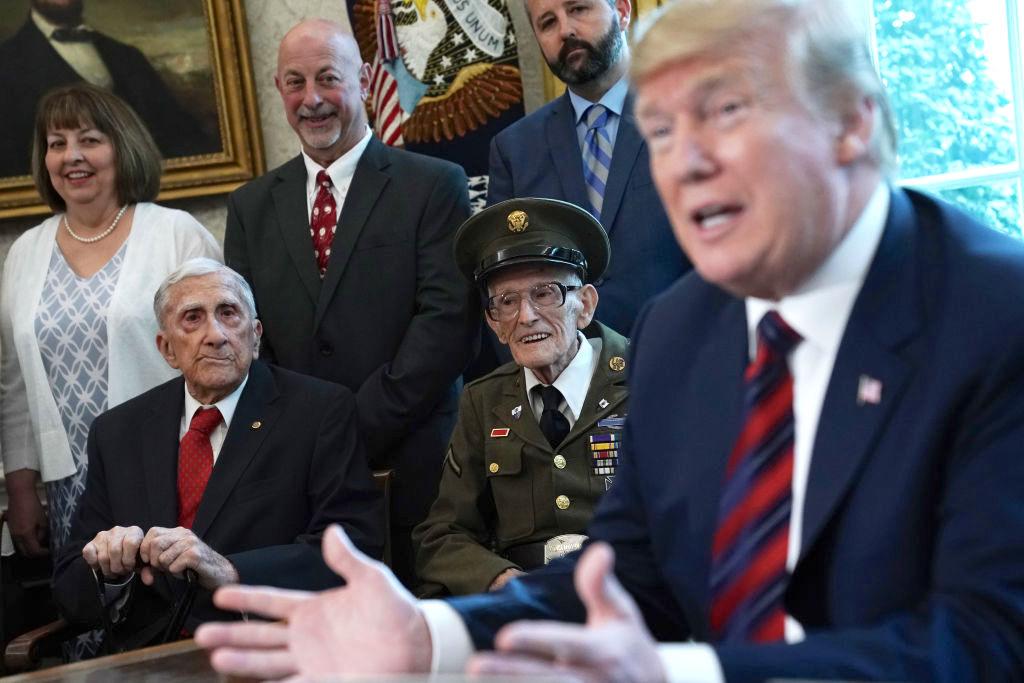 President Donald Trump speaks as he meets with World War II veterans including Paul Kriner (2nd L) and Floyd Wigfield (3rd L) in the Oval Office of the White House on April 11, 2019. (©Getty Images | <a href="https://www.gettyimages.com/detail/news-photo/president-donald-trump-speaks-as-he-meets-with-world-war-ii-news-photo/1142037538?adppopup=true">Alex Wong</a>)