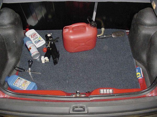 This undated handout photo shows a pair scissors and a petrol container in the trunk of Ian Huntley's car. (Cambridgeshire Constabulary via Getty Images)
