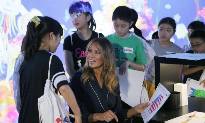 Melania Trump Colors Fish With Kids at Japan Digital Museum