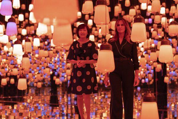U.S. First Lady Melania Trump, right, and Japanese Prime Minister Shinzo Abe's wife Akie Abe visit a digital art museum in Tokyo, Japan on May 26, 2019. (Koji Sasahara/AP)