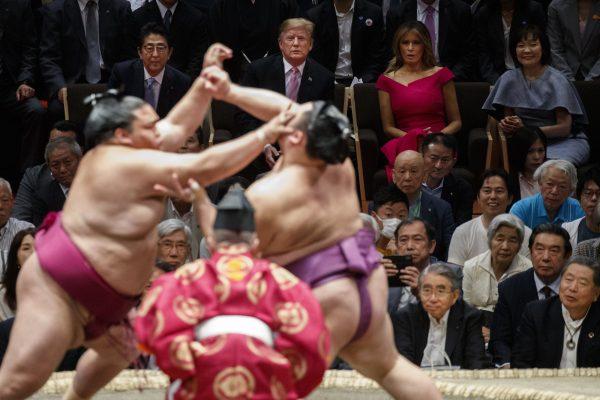 President Donald Trump attends the Tokyo Grand Sumo Tournament with Japanese Prime Minister Shinzo Abe at Ryogoku Kokugikan Stadium in Tokyo, japan on May 26, 2019. (Evan Vucci/AP)