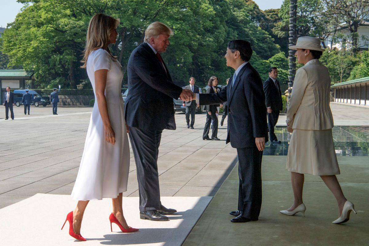 President Donald J. Trump and First Lady Melania Trump are greeted by Japan's head of state Naruhito and his wife Masako upon their arrival at the royal palace in Tokyo, Japan, on May 27, 2019. (Carl Court/Pool via Reuters)