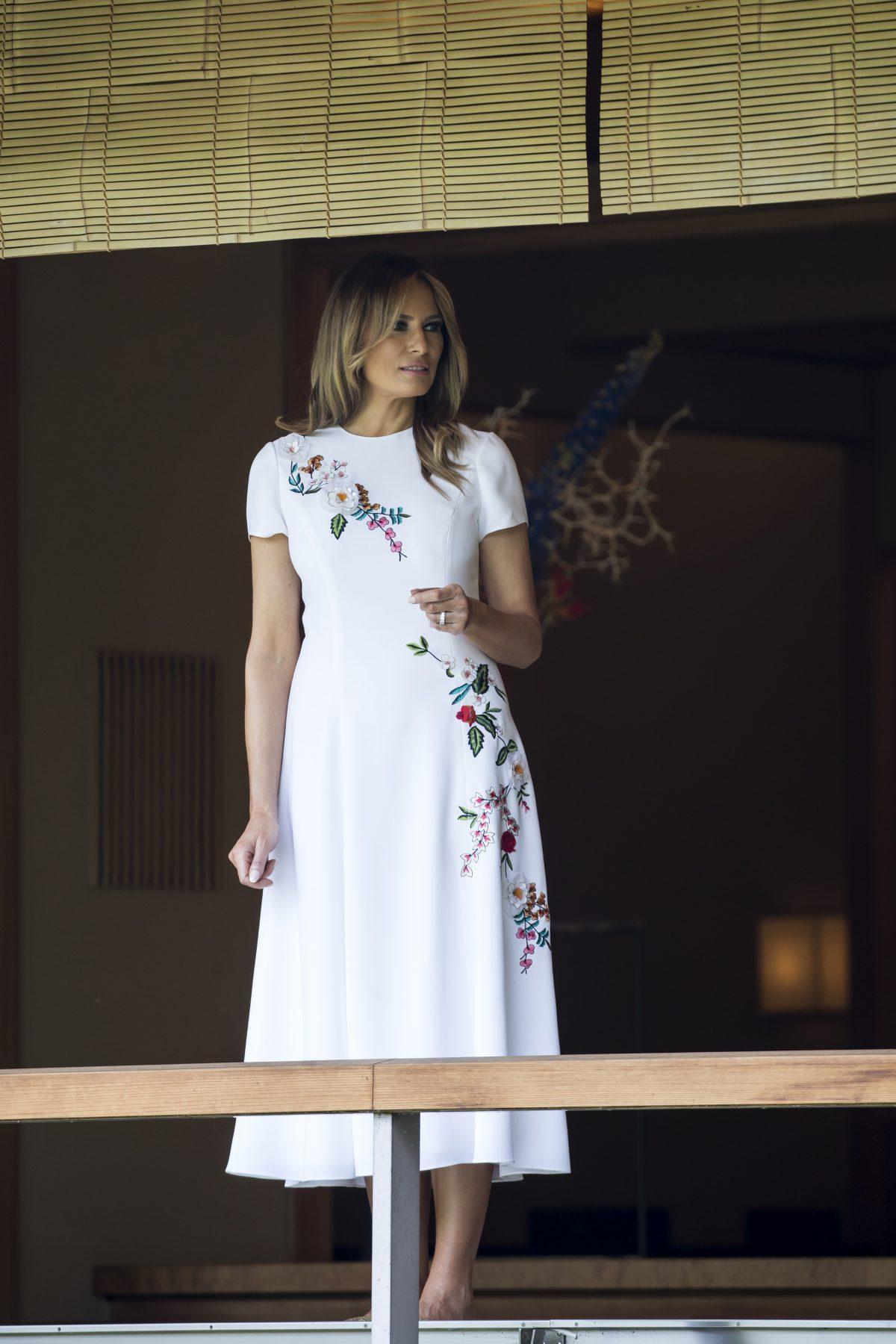 First Lady Melania Trump visiting a pond at the Japanese style annex inside the State Guest House to look at koi carps in Tokyo, Japan, on May 27, 2019. (Tomohiro Ohsumi/Getty Images)