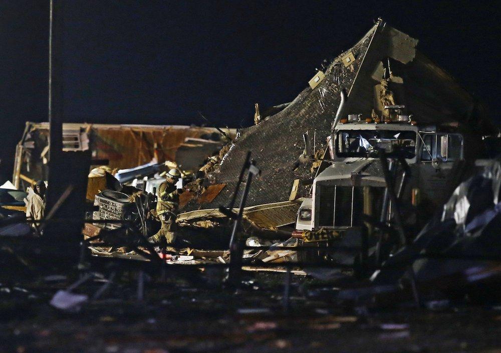 Emergency workers search through debris from a mobile home park, in El Reno, Okla., on May 26, 2019. (Sue Ogrocki/AP Photo)