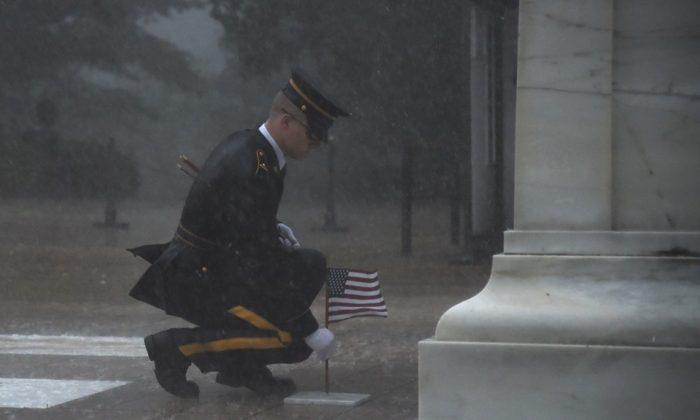 Video Shows Soldier Placing Flag Down at Tomb of Unknown Solider in Storm