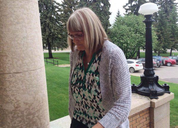 Angela Nicholson arrives at court in Prince Albert, Sask., on May 25, 2016. Two lovers who were convicted of plotting to kill their spouses in Saskatchewan are to be sentenced today. A jury found Curtis Vey and Angela Nicholson guilty in June of conspiracy to commit murder. (Jennifer Graham/The Canadian Press)