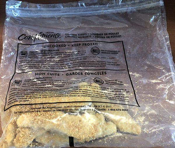 A bag of Compliments chicken strips that are subject to a recall issued May 24, 2019. (Canadian Food Inspection Agency)