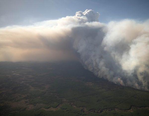 A fire burns near High Level, AB. on May 21, 2019 in this handout photo from the Alberta Government. (HO, Chris Schwarz, Government of Alberta/The Canadian Press)