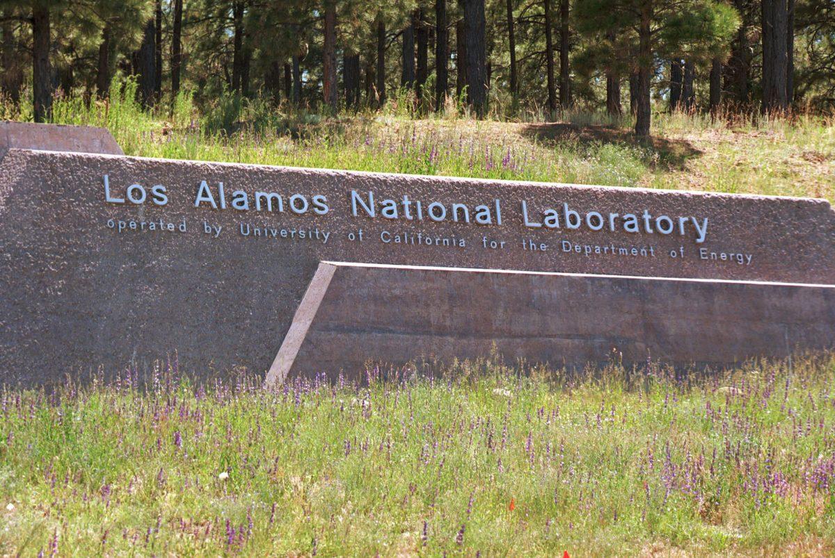 A sign welcomes visitors to the Los Alamos Laboratory after they cross over the Omega Bridge in Los Alamos, N.M., on June 14, 1999. (Joe Raedle/Getty Images)