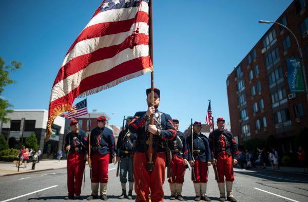 Veterans march on the street during the 152nd Memorial Day Parade in the New York City borough of Brooklyn on May 27, 2019. (Johannes Eisele/AFP/Getty Images)