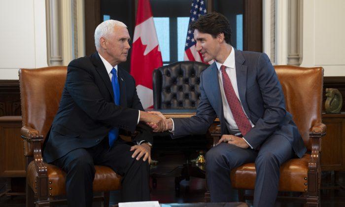 Pence Visits Ottawa, Promises to Discuss Detained Canadians in Talks With China