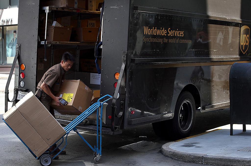 Illustration - Getty Images | <a href="https://www.gettyimages.com/detail/news-photo/united-parcel-service-driver-loads-a-cart-with-boxes-before-news-photo/450772758?adppopup=true">Justin Sullivan</a>