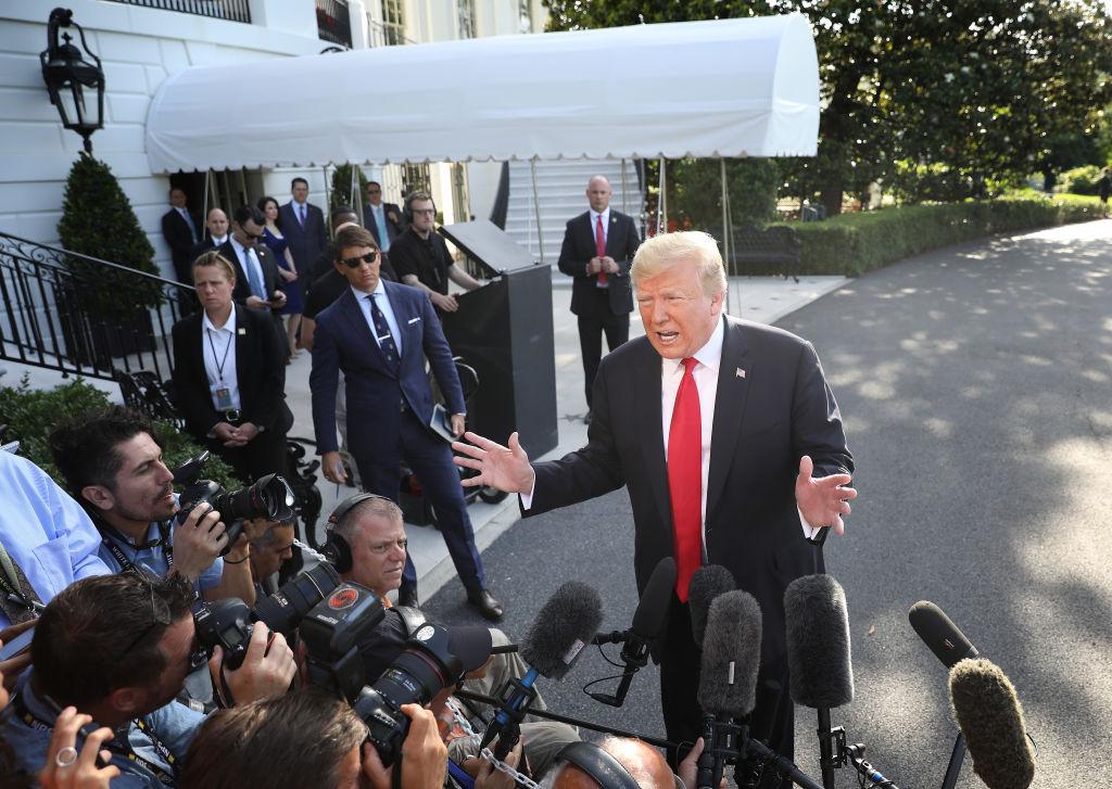 President Donald Trump answers questions on the comments of special counsel Robert Mueller while departing the White House on May 30, 2019. (Win McNamee/Getty Images)
