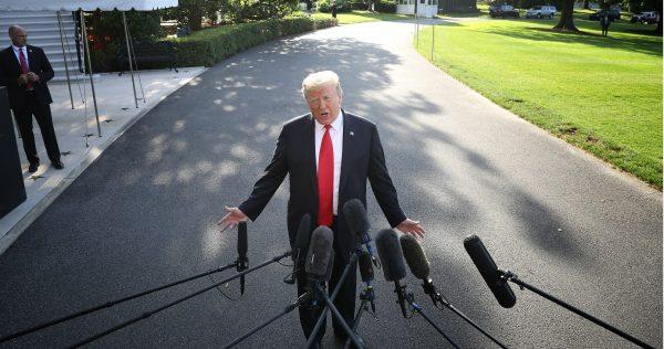 President Donald Trump answers questions on the comments of special counsel Robert Mueller while departing the White House in Washington, on May 30, 2019. (Win McNamee/Getty Images)