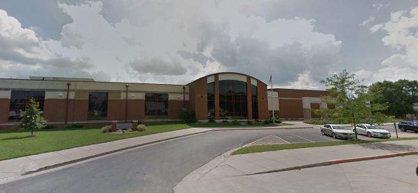 Some students were forced to take blankets from home before hanging them up in the stalls for privacy at Beardstown High School in Illinois, pictured above (Google Street View)