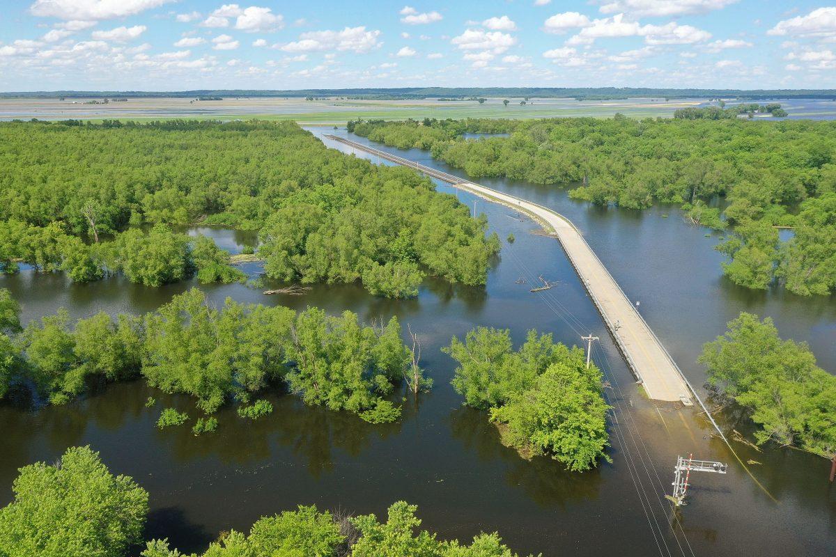 Floodwater from the Mississippi River cuts off the roadway from Missouri into Illinois at the states' border in Saint Mary, Miss., on May 30, 2019. (Scott Olson/Getty Images)