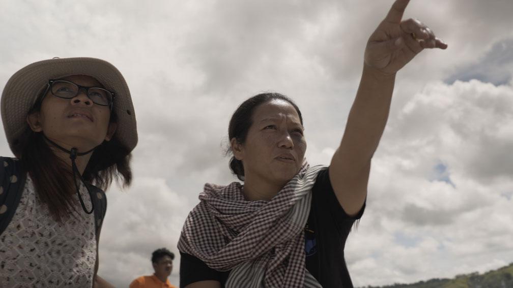 Journalist Chutima “Oi” Sidasathian (L) and Patima Tungpuchayakul, an agent of the Labour Rights Promotion Network, seeking escaped Thai fisherman slaves, in "Ghost Fleet." (Vulcan Productions)