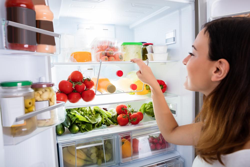 It can take as little as 4 hours for your fridge to become a "danger zone" (Illustration - Shutterstock | <a href="https://www.shutterstock.com/image-photo/closeup-young-woman-searching-food-fridge-561902797?src=BrcW5NtrrNIieHpBE-B_Cg-1-6">Andrey_Popov</a>)