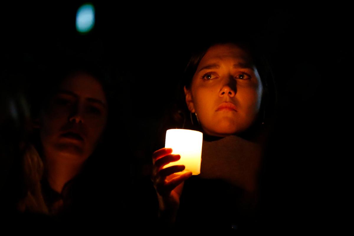 Mourners pay their respects at Royal Park in Melbourne, Australia on May 31, 2019. (Darrian Traynor/Getty Images)