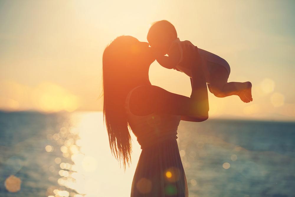 Illustration - Shutterstock | <a href="https://www.shutterstock.com/image-photo/mother-baby-having-fun-sunset-on-299616440">SunKids</a>